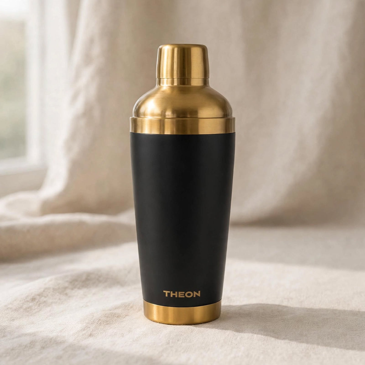 THEON black and brushed gold thermo shaker